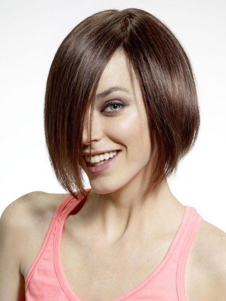 Brunette bob with an angled cutting line and shorter neck section