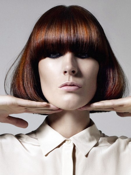 Classic chin-length bob with bangs and volume