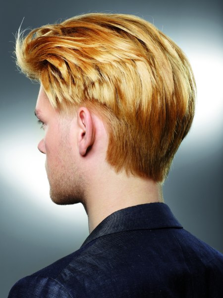 Back view of a men's haircut with a graduated neck