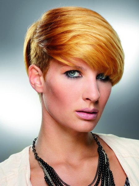 Short hairstyle with an undercut and sleek top hair