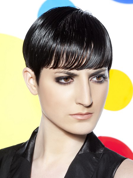Slick short women's hair styled with pomade