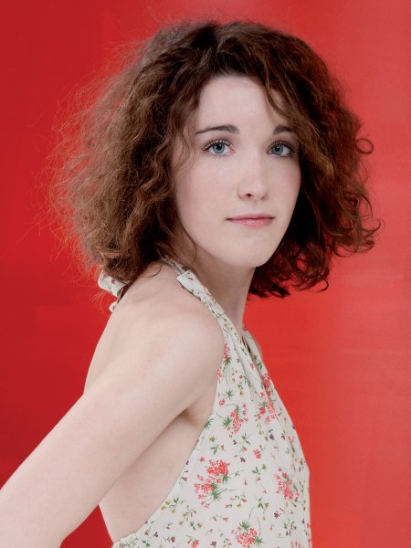 Medium-length haircut with curls for active women