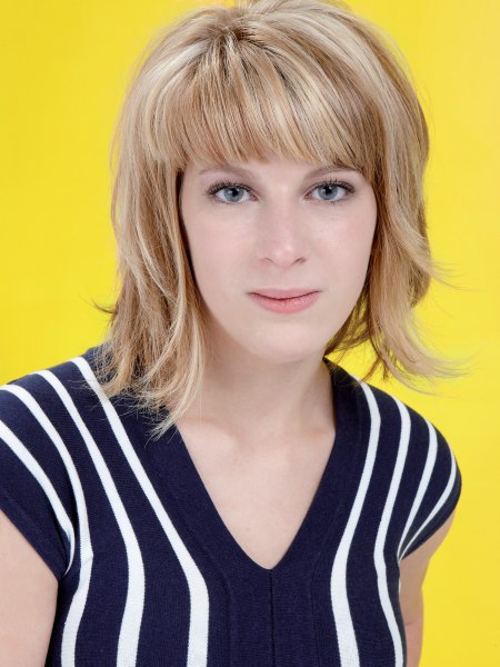 Blonde bob with curved and flipped out sides