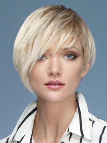 Ear-revealing haircut for short blonde hair