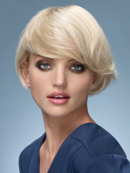 Fluid short blonde hair with curved sides