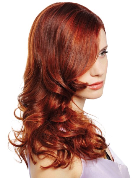 Long romantic red hair with layers and curls