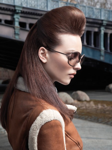 Long hair updo with a quiff and sleek length