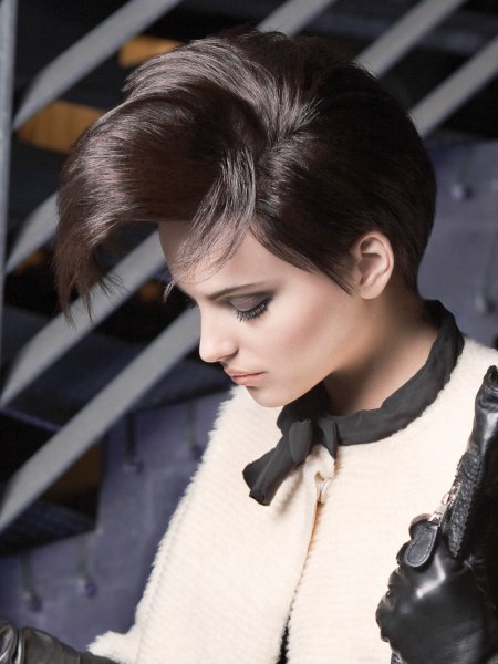 Dynamic short hair with the bangs styled into an arch