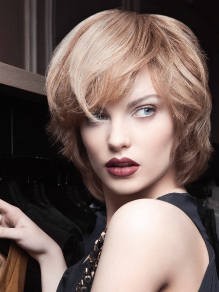 Feminine and sassy medium-long blonde hairstyle