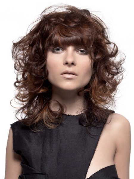 Brown layered hair, cut below the shoulders