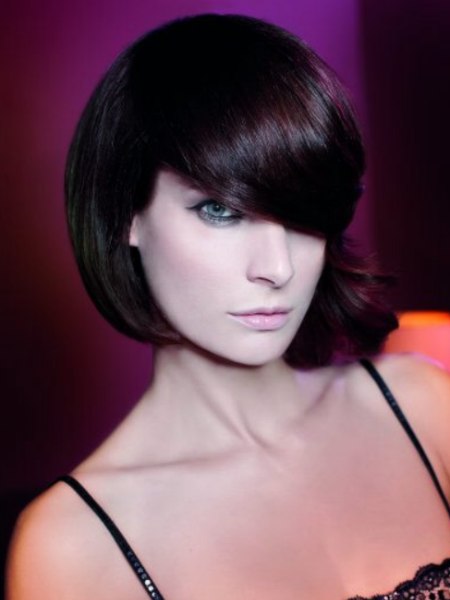 Sleek short bob with a deep fringe