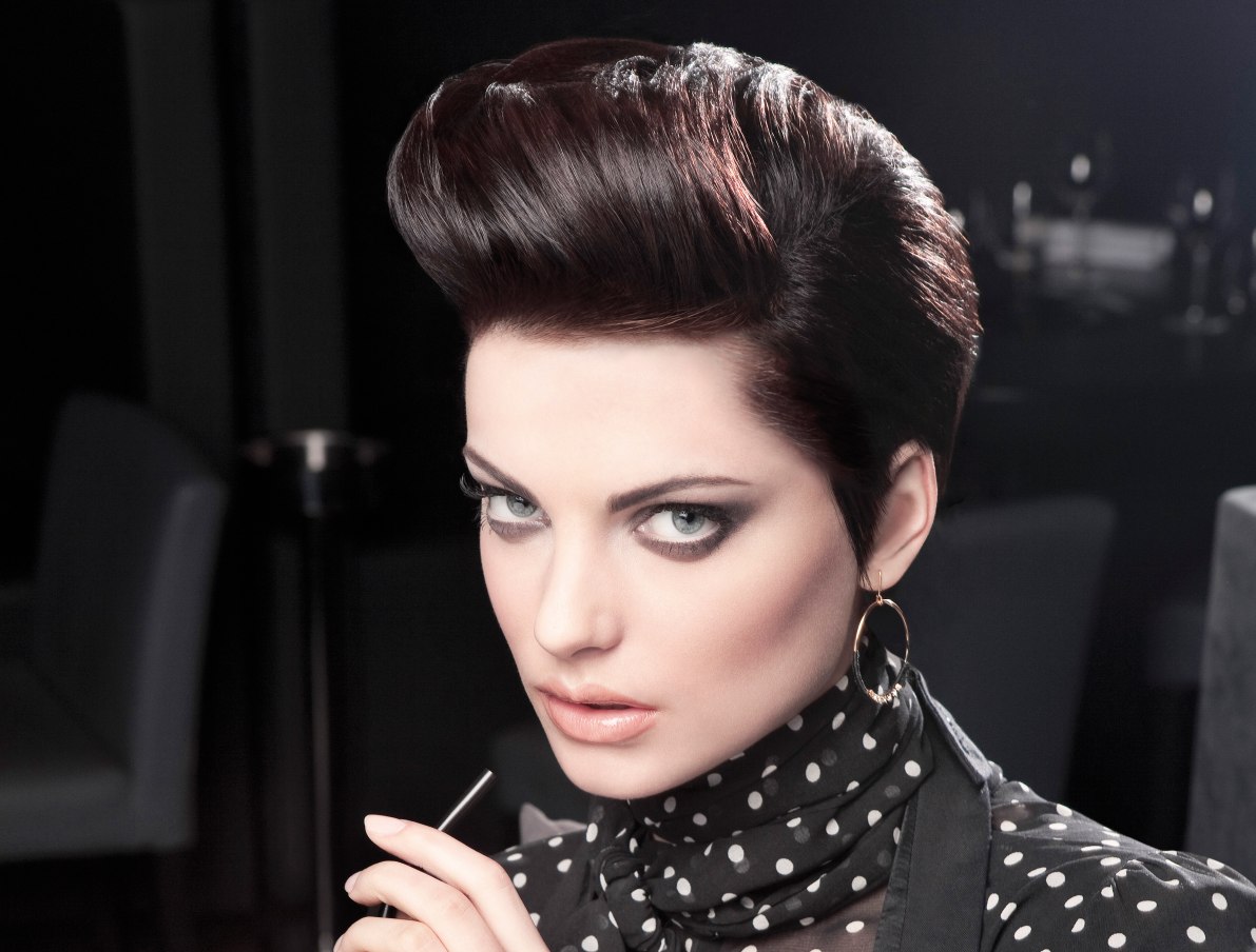 Short haircut with a retro quiff shape and hair that clings to the head