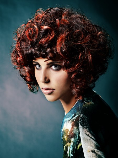 Short cut for reddish brown hair with large and small curls