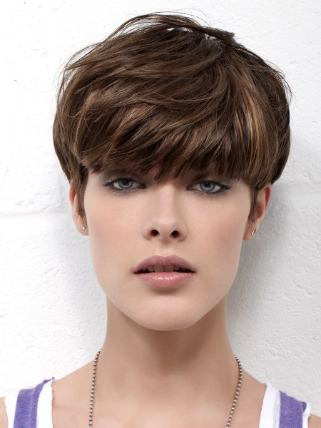 Mushroom haircut with long bangs and very short sides