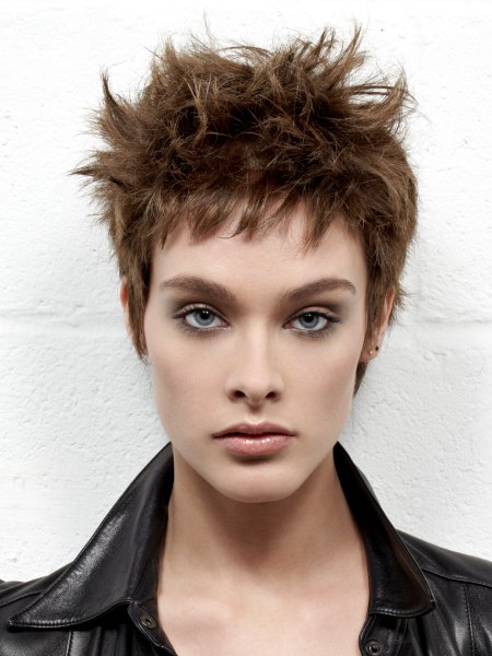 Short women's haircut with varying lengths and soft tips