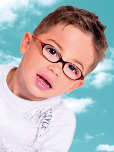 Sporty short haircut for boys wearing glasses