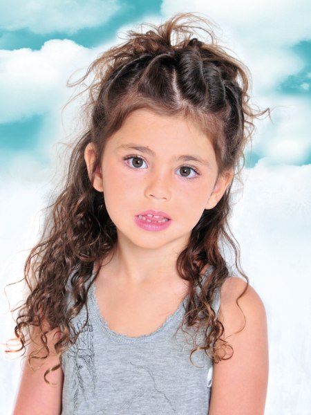 Little girls hairstyle with twists and tousles