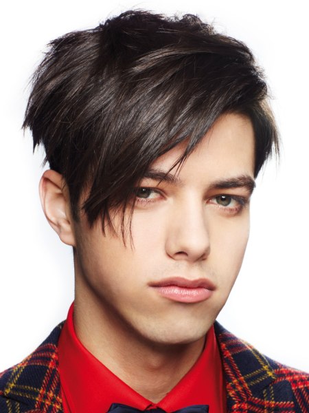 Male haircut with a long fringe and textured top hair
