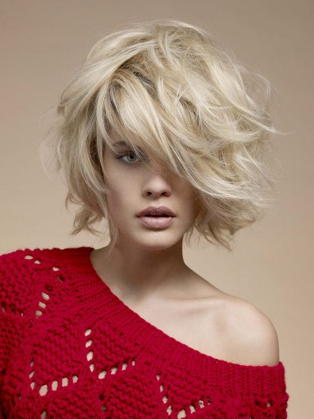 Stylish blonde bob with thick layers and motion