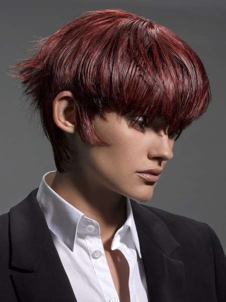 Short mod hair with exaggerated side burns for women