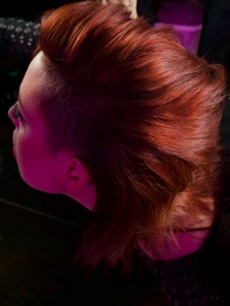 Female rocker look hairstyle with shaven sides