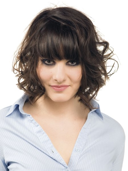 Bob haircut with curls and straight bangs