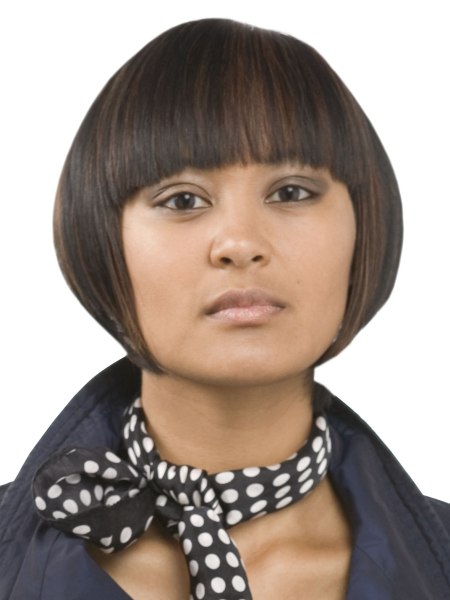 A-line bob cut wih tight fitting sides and bangs