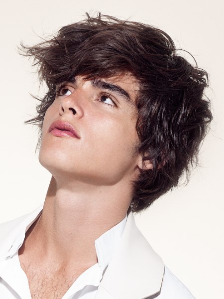 Modern male haircut with layers