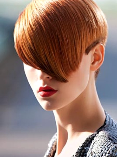 Short cubism haircut with a long fringe