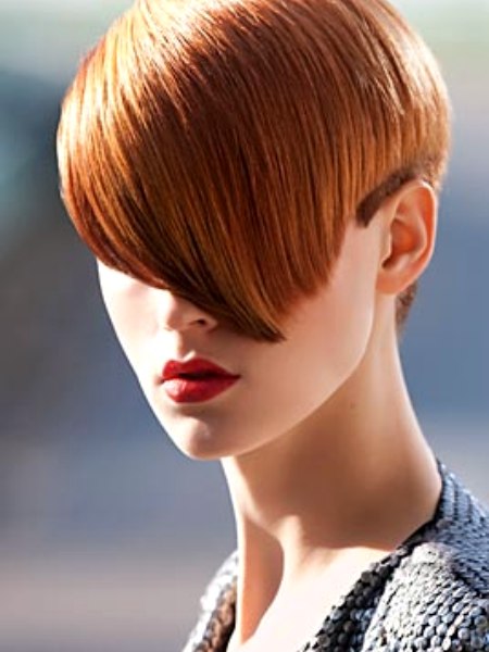 Short cubism haircut with a long fringe