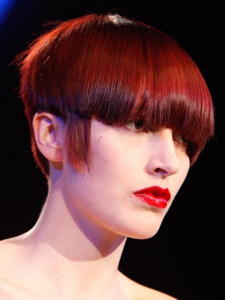 Short female haircut with sideburns