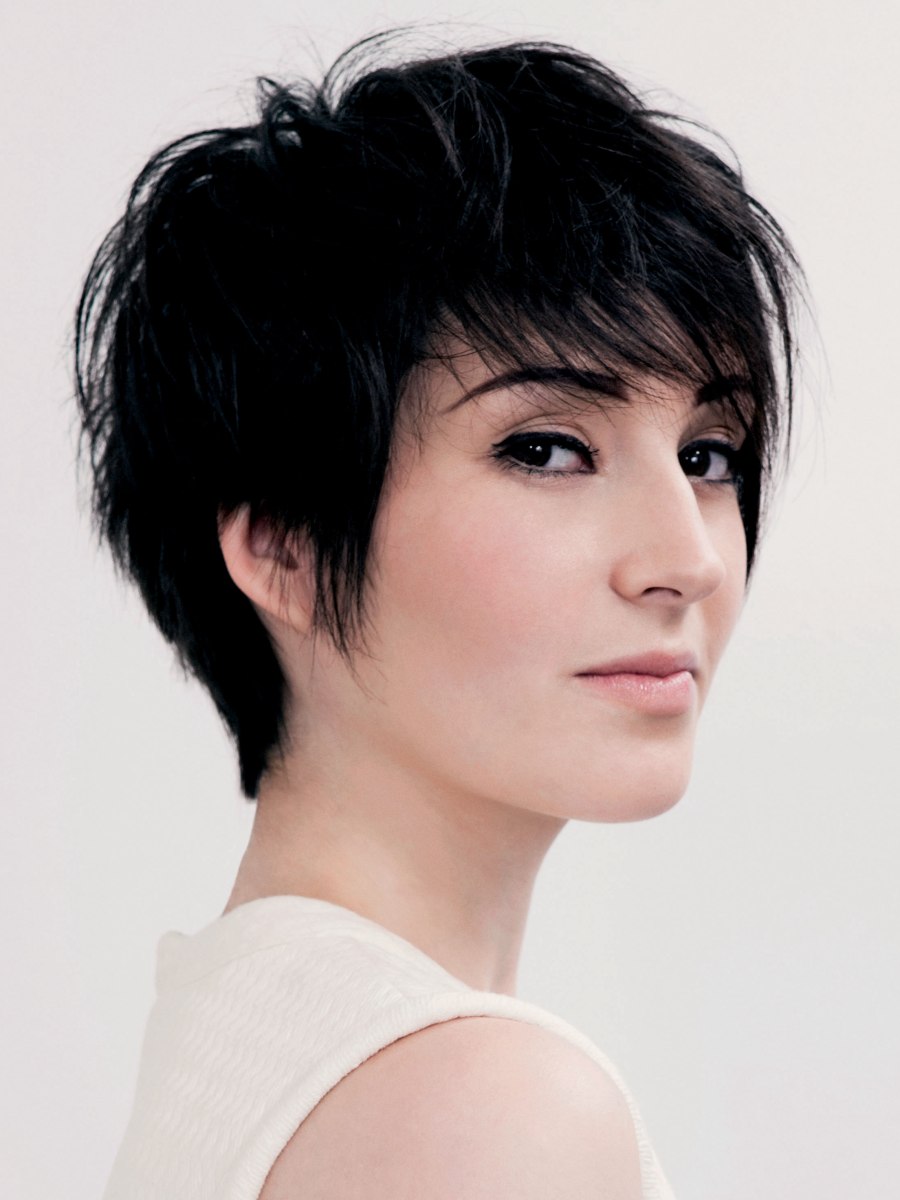 Feminine and fashionable short  haircut  with lift in the roots