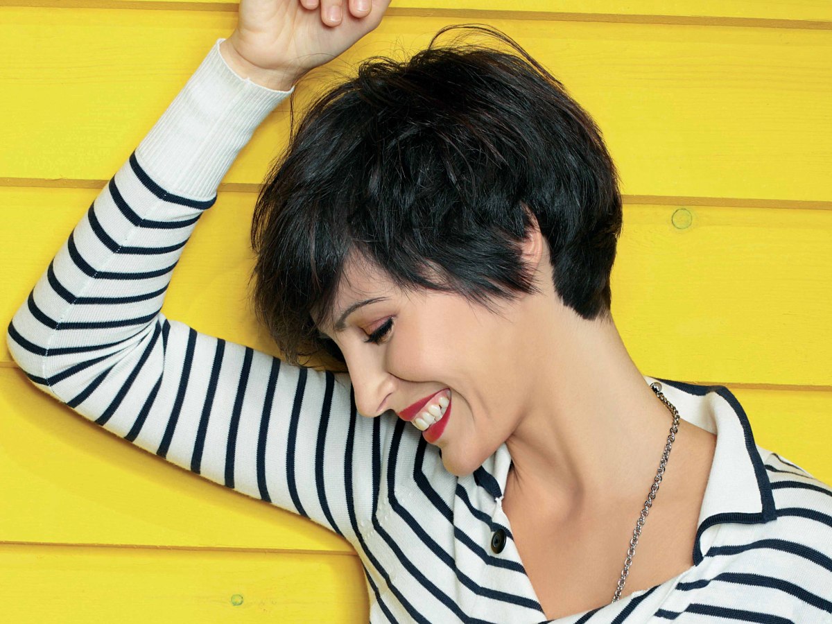 Model with short hair over her ears