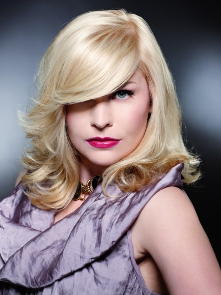 Sophisticated medium long blonde hairstyle for all ages