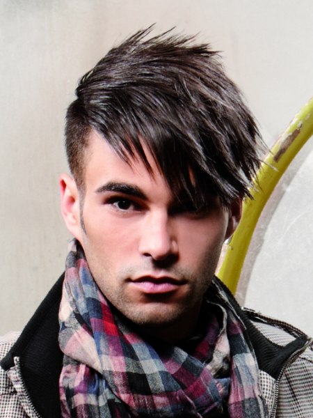 Messy hair look with spiked bangs for men