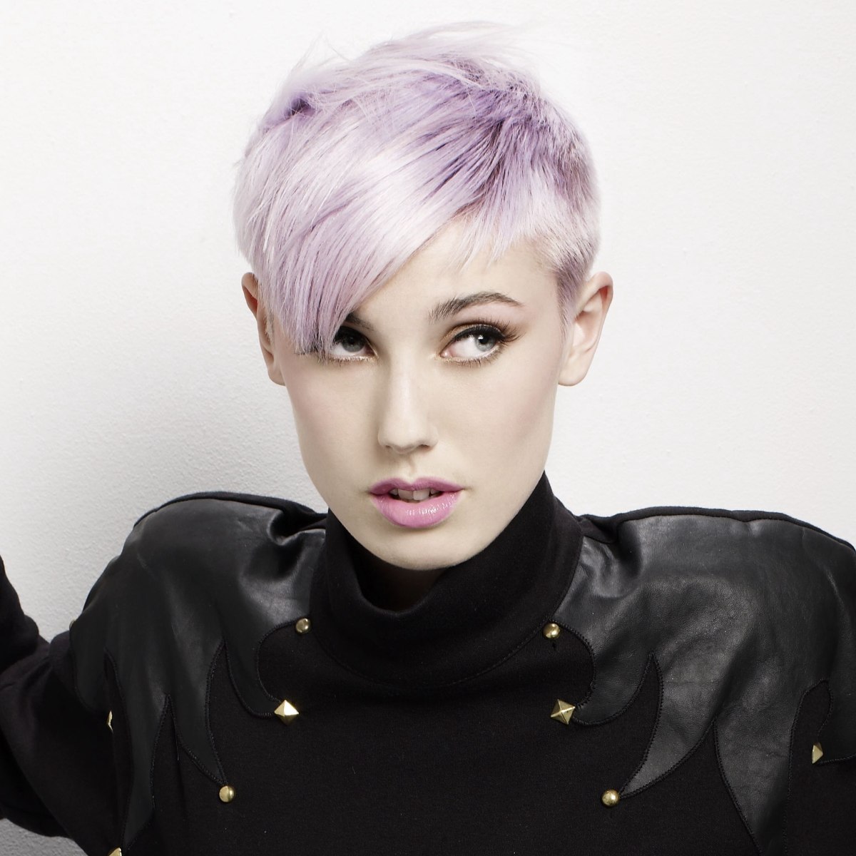 Modern short haircut with cropped sides and purple shades