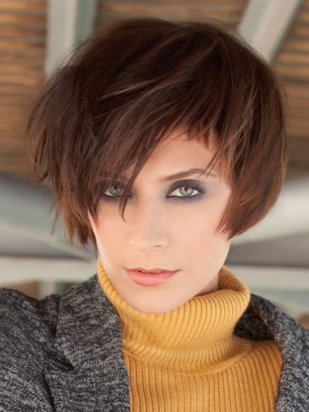 Short haircut with hair that clings close to the face