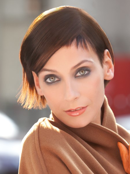 Neat short haircut with the sides tucked behind the ears
