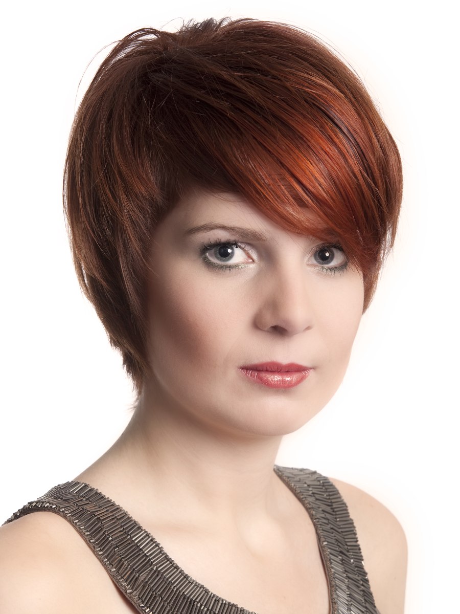 Short tapered hairstyle with undercut sections and a ... Short tapered hairst