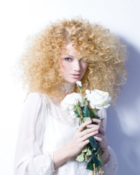Blonde wedding hair with corkscrew curls