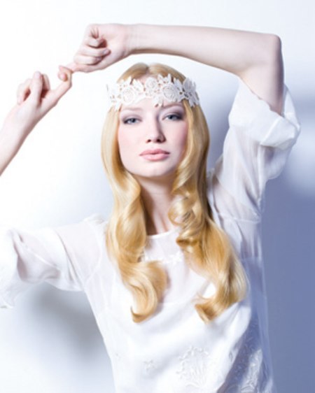 Blonde wedding hairstyle with a lace headband