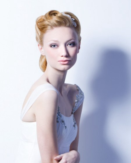 Timeless and elegant wedding updo with soft lines