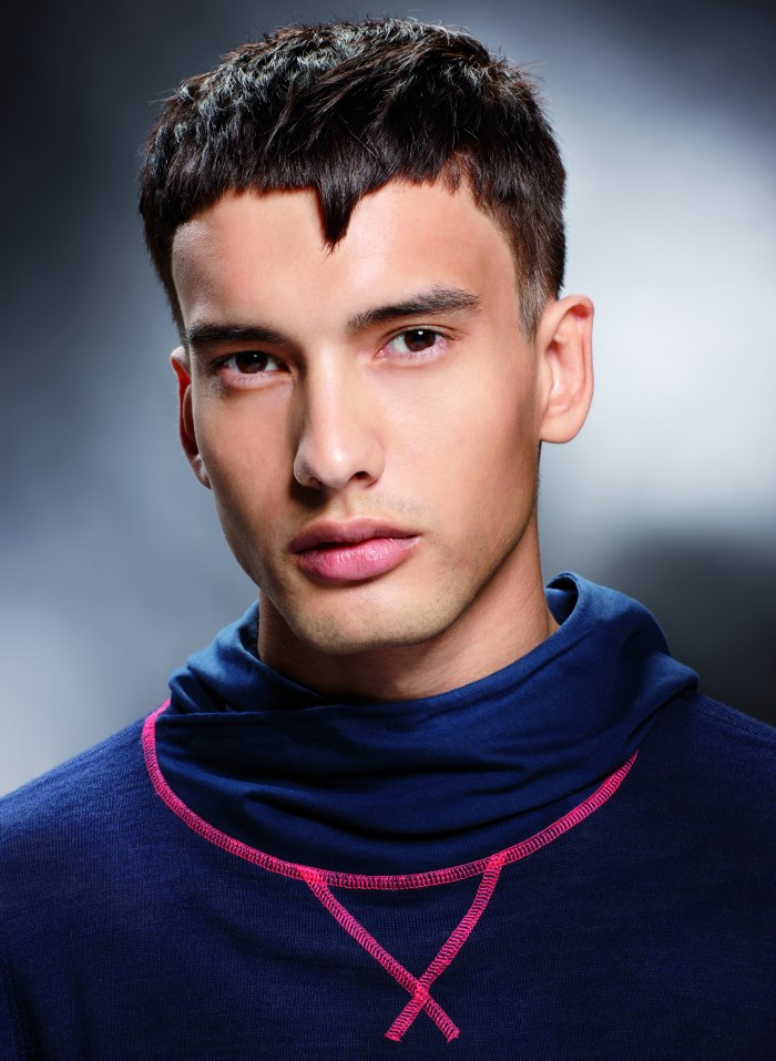 Short men's haircut with a triangle on the forehead Short men's haircut with a triangle on the forehead