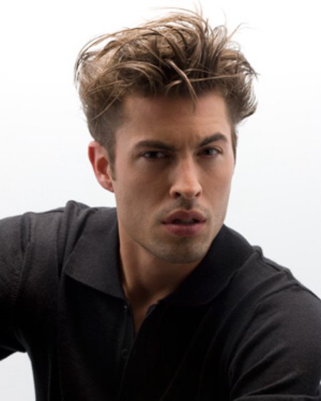Stylish men's haircut with volume on top of the head