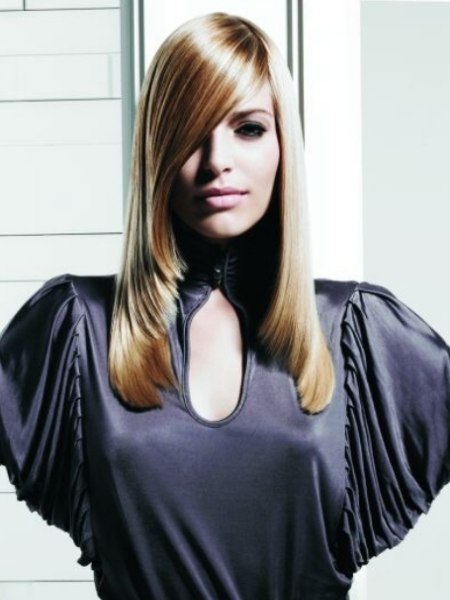 Long tapered blonde hair with a low side partition