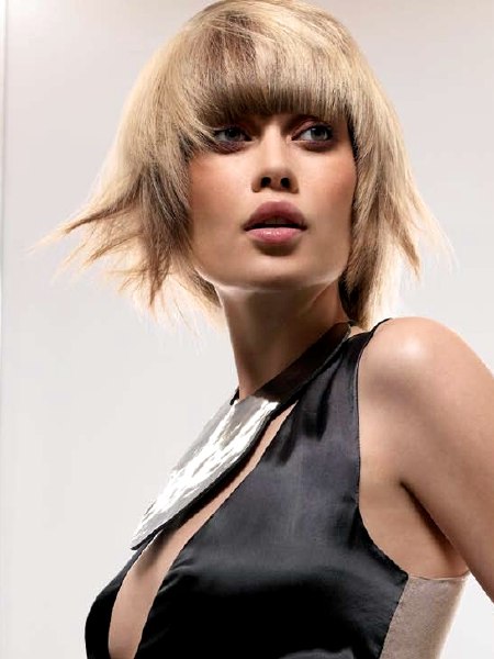 Shaggy blonde bob with tapered sides