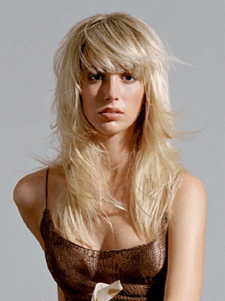 Blonde below the shoulders hair and bangs with bulk