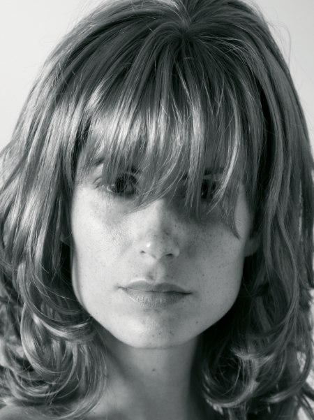 Model before long-to-short hair makeover