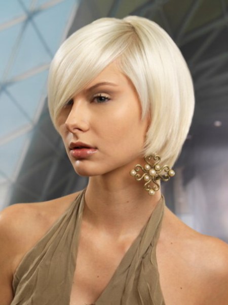 blonde rounded bob with a partition that overlaps