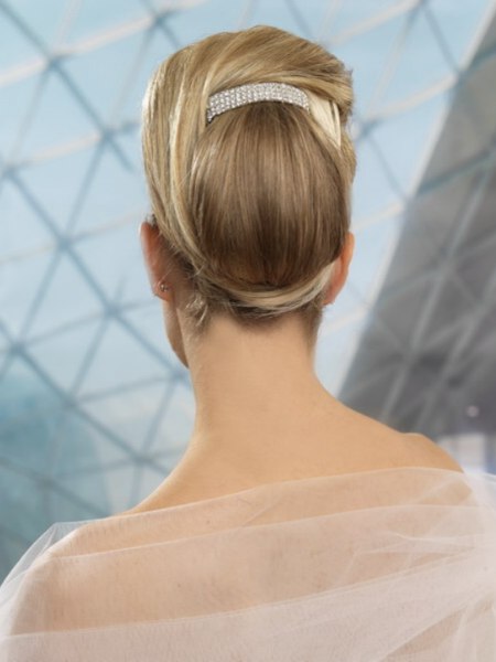 Hair styled up with a barrette